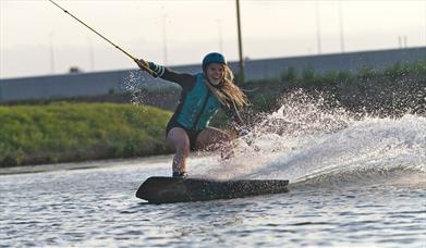 A woman using the high speed cable wake line