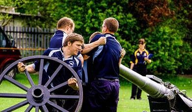 A team takes part in a Field Gun event