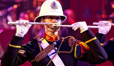 A drummer from The Royal Marines School of Music performs