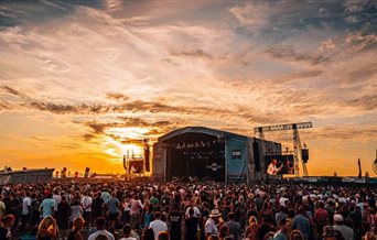 Sunset at the Victorious Festival main stage as Brian Wilson performs