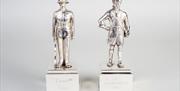 Two Royal Marine statuettes, given by Price Phillip