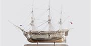 Made of copper from HMS Victory and plated in silver, this model of HMS Victory was presented to Portsmouth in 1964 when the Portsmouth Command of the