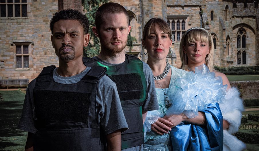 Press shot for Changeling Theatre's Othello, featuring four actors in front of a historic house