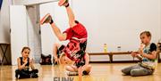 Youngster breakdancing at Funk Format Street Dance Classes