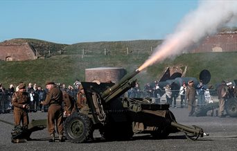 Big guns being fired at Fort Nelson