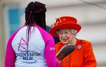 Kadeena Cox receiving the Baton from The Queen at the Queen's Baton Relay launch