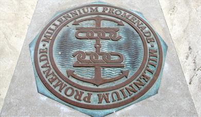 A view of a guide marker along the Millennium Promenade.
