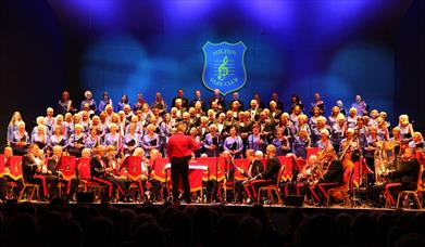The Milton Glee Choir performing on stage