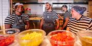 Kitchen staff at Pizza Express in Gunwharf Quays