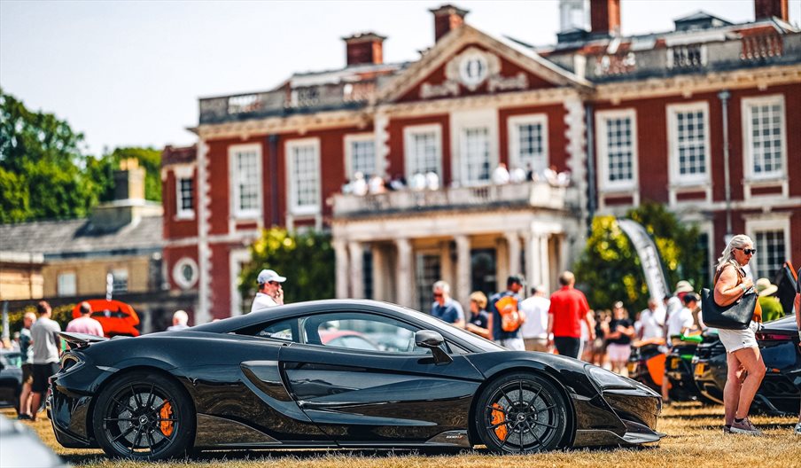 A car on display at the Steeleford Supercar Show with Stansted House in the background