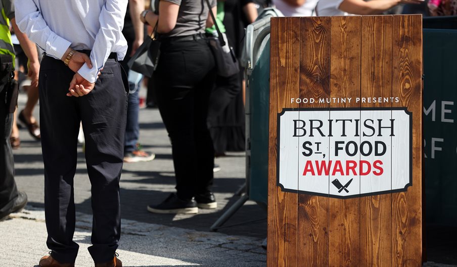 Wooden stand showing the British Street Food awards logo