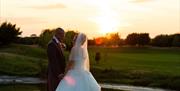 Sunset wedding at Cams Hall Estate Golf Club