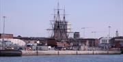 View of Portsmouth Historic Dockyard and HMS Victory from the sea