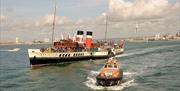 Waverley sailing away from Portsmouth
