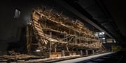 The salvaged hull of The Mary Rose, on display inside its own purpose-built museum at Portsmouth Historic Dockyard