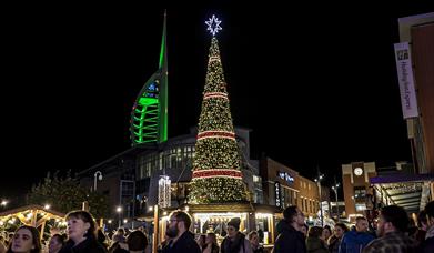 Christmas tree at Gunwharf Quays with the Spinnaker Tower in the background