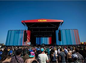 stage at Reading Festival with climate stripes exhibited