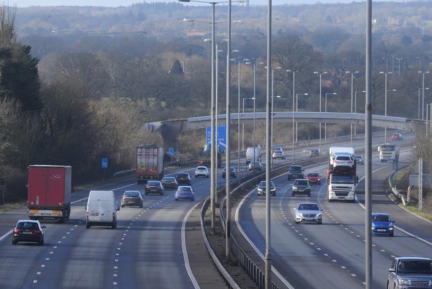 Motorway with signs pointing to A33 and M4