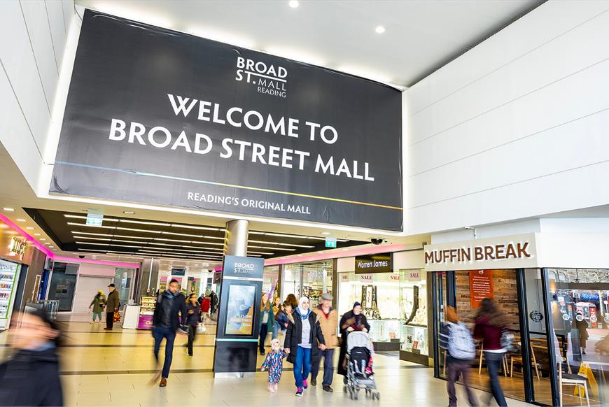 Interior of Broad Street Mall in Reading, with shoppers in front of shops