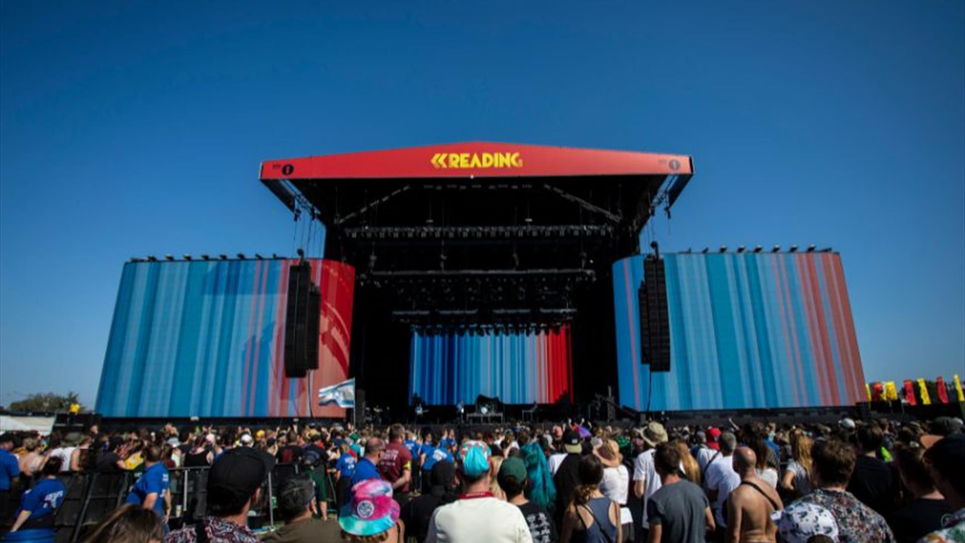 stage at Reading Festival with climate stripes exhibited