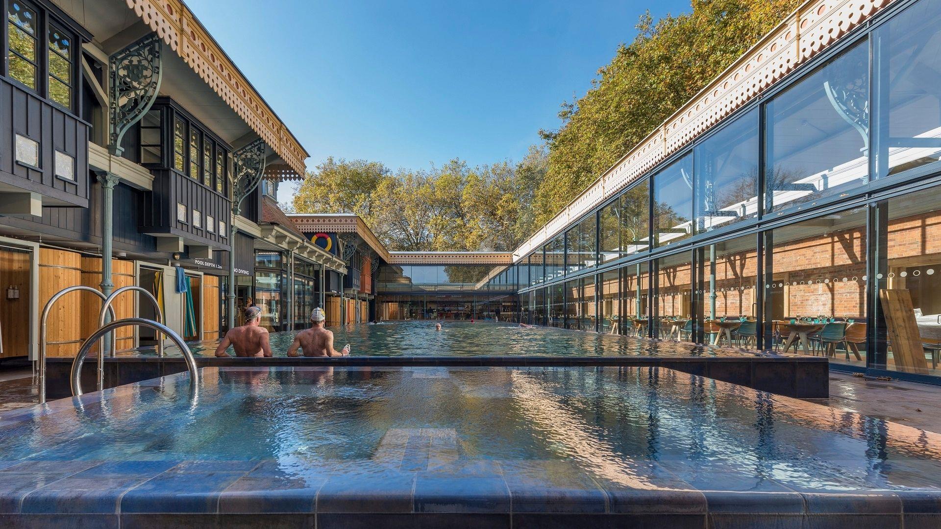 2 bathers relaxing in a pool