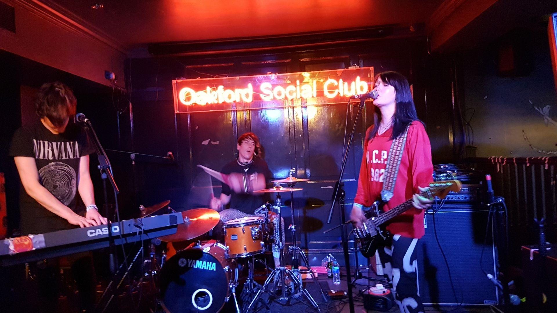 Band playing music at the Oakford Social Club n Reading as part of the Are You Listening Festival