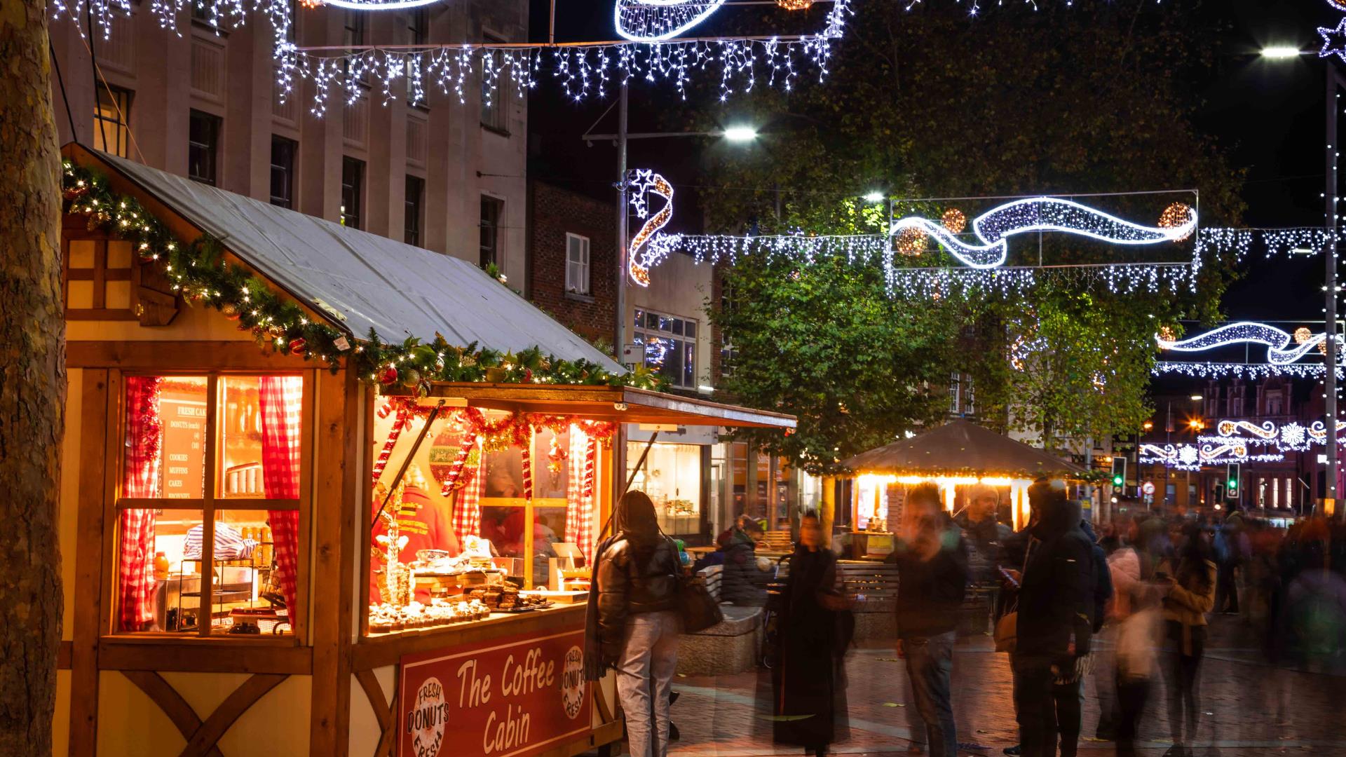 The Coffee Cabin on Broad Street in Reading, with Christmas lights and blurred crowds