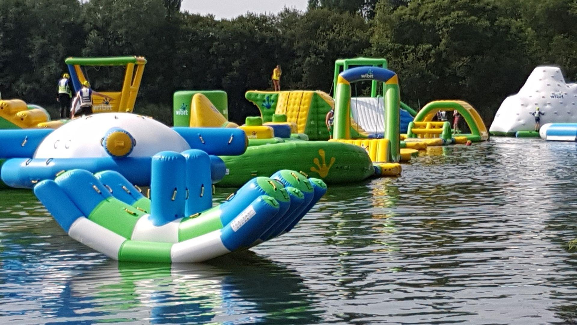 inflatable water park on a lake