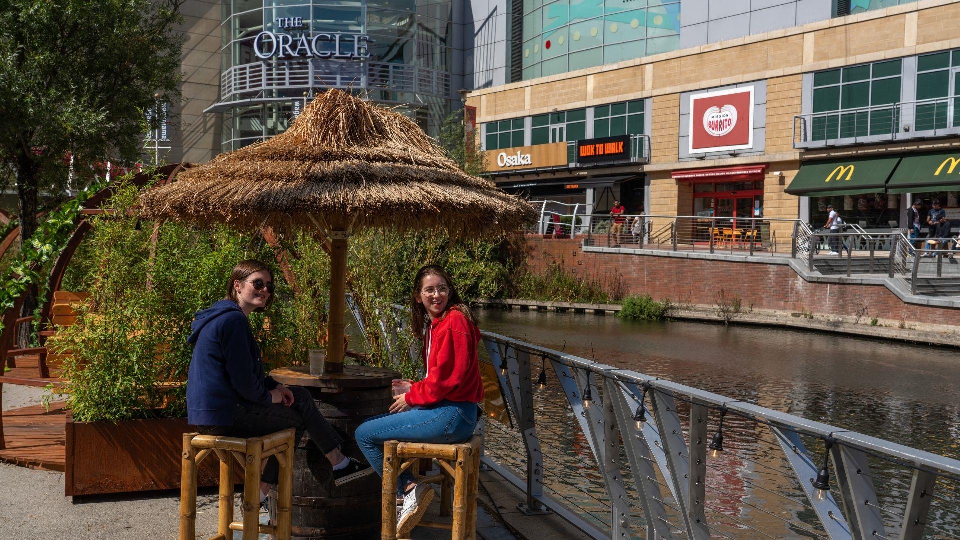 Girls having a drink at Oracle Riverside Bar