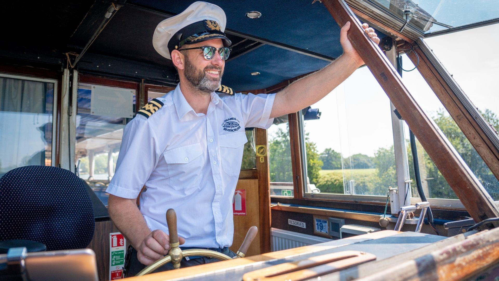Thames River Cruise captain sailing a boat