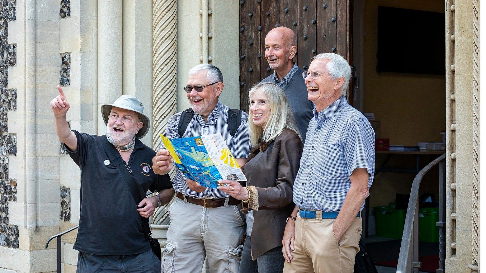 group of pilgrims on steps of St James Church