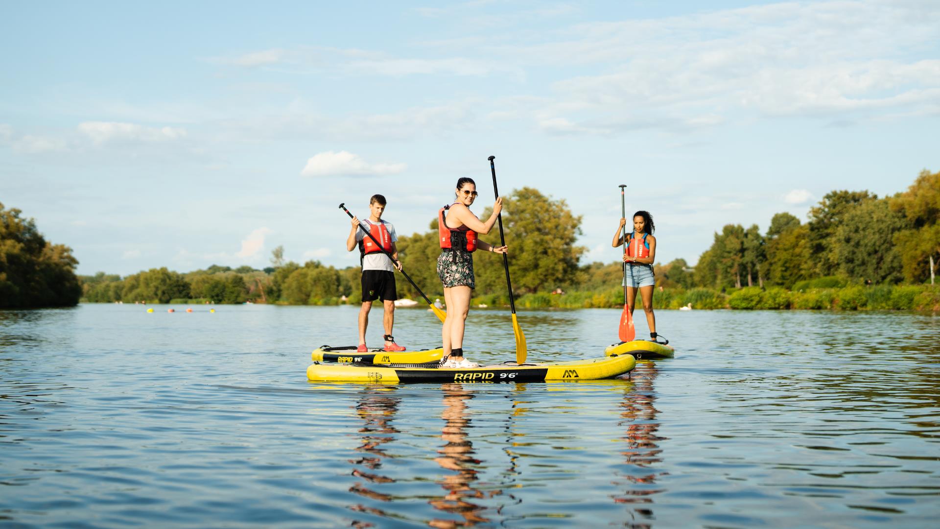 Paddleboarders on river