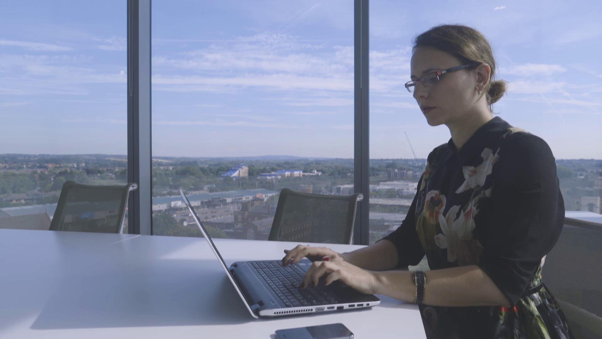 woman working at a laptop