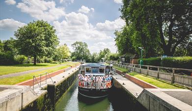 Caversham Princess with passengers onboard in Mapledurham Lock