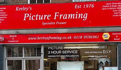 front window of picture framing shop
