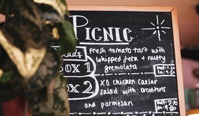 Picnic written on a black board