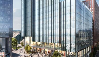 glass office towers in front of a new square at Station Hill