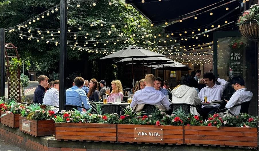 Outdoor seating under string lights