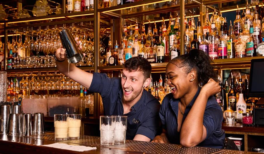 Cocktails being made at the bar