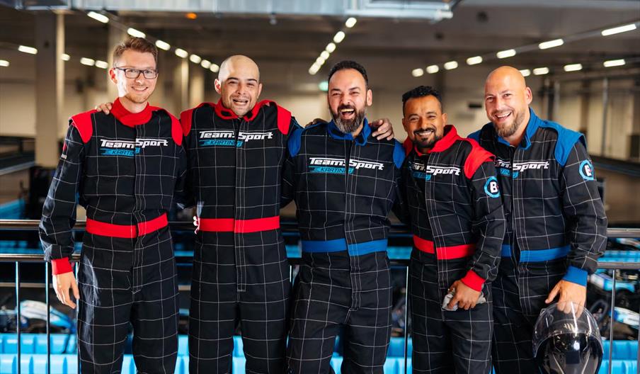 Five men in driving boiler suits
