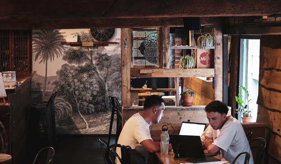 Two men working at a table