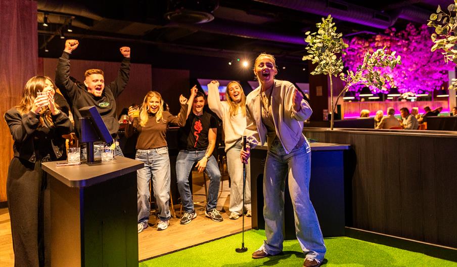 Group playing crazy golf