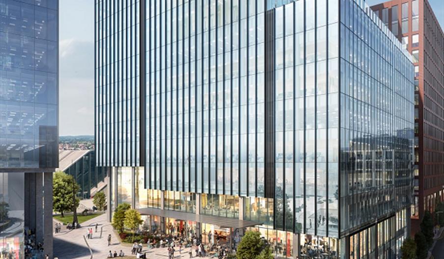 glass office towers in front of a new square at Station Hill