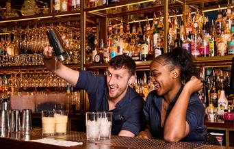 Cocktails being made at the bar