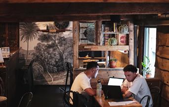 Two men working at a table