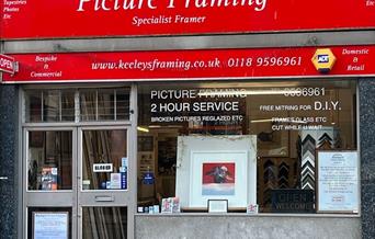 front window of picture framing shop