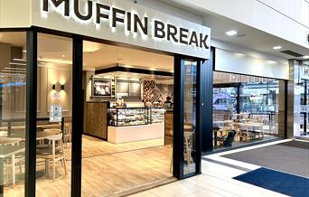 front of Muffin Break