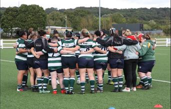 women team huddle