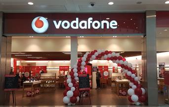 front of Vodafone