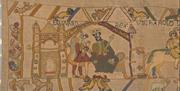 A close up of a section of Britain's Bayeux Tapestry in Reading Museum